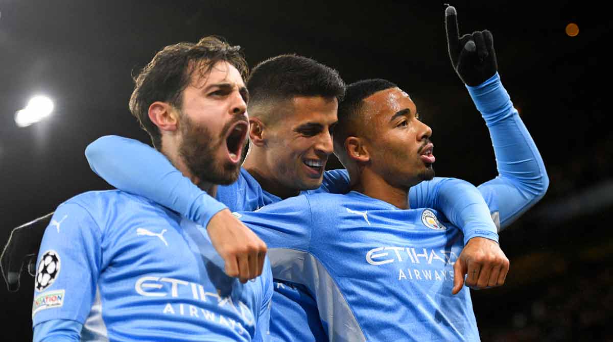 Manchester City beats PSG 2-1, both advance in Champions League