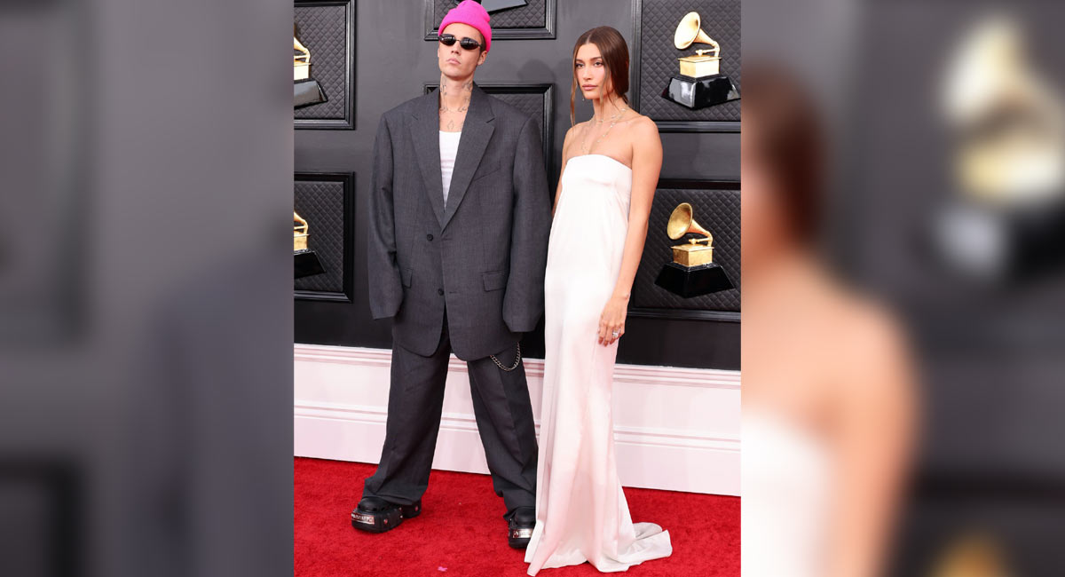Hailey Bieber poses on Grammys red carpet with Justin Bieber